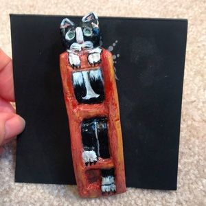 Hand made Cat in ladder pin. One of a kind!Made by an artist in La Rioja, Spain.